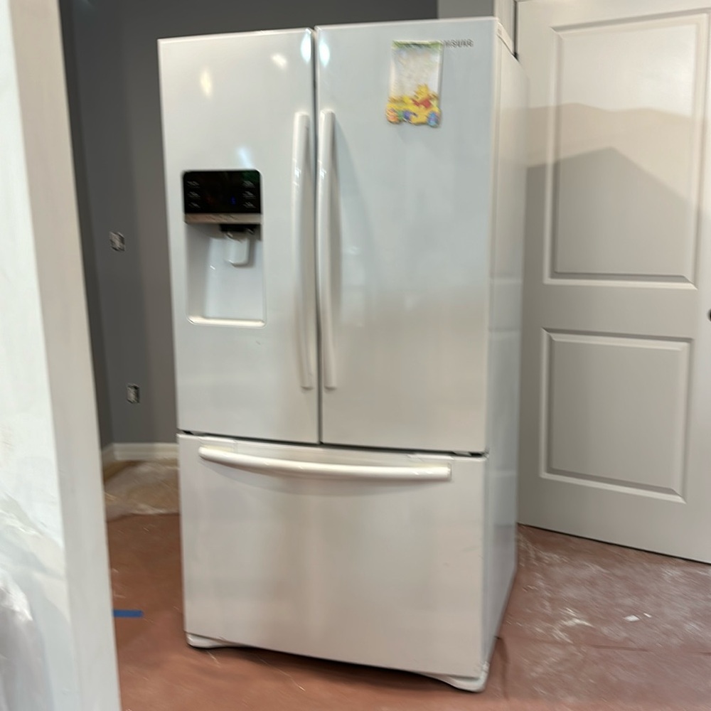 Samsung refrigerator. Great for single apartment.